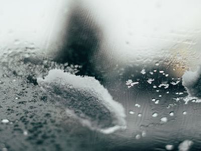 Minimalist frost patterns on glass window pane